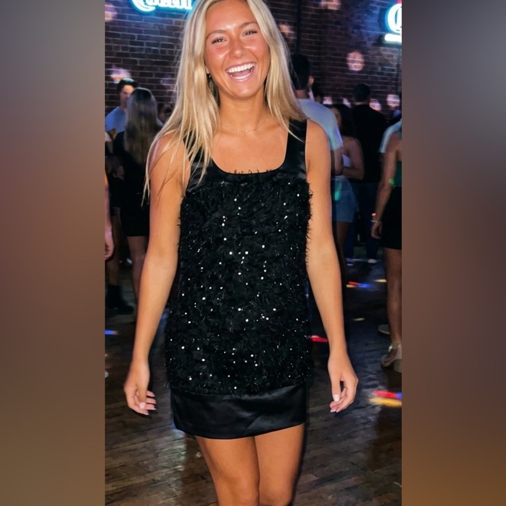 Sparkling fluffy fringed black dress